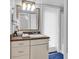 Bathroom showcasing a vanity with drawers, a large mirror, and a shower with white blinds at 3866 Highway 17 Business # C- 9, Murrells Inlet, SC 29576