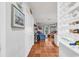 Bright living room with terracotta flooring, wine rack, and outdoor view from the doorway at 3866 Highway 17 Business # C- 9, Murrells Inlet, SC 29576