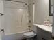 Bathroom with shower, toilet, and gray granite vanity at 3955 Gladiola Ct. # 301, Myrtle Beach, SC 29588