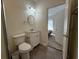 Bright bathroom featuring a vanity with storage, updated fixtures, and tiled floors at 3955 Gladiola Ct. # 301, Myrtle Beach, SC 29588