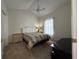 Cozy bedroom featuring a vaulted ceiling, ceiling fan, and neutral carpet at 3955 Gladiola Ct. # 301, Myrtle Beach, SC 29588