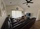 Bright living room featuring a large sectional sofa, ceiling fan, and sliding glass doors at 3955 Gladiola Ct. # 301, Myrtle Beach, SC 29588
