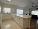 Open-concept living space with kitchen, dining area, and living room, perfect for entertaining at 3955 Gladiola Ct. # 301, Myrtle Beach, SC 29588