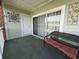 Cozy covered patio with seating at 3955 Gladiola Ct. # 301, Myrtle Beach, SC 29588