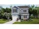 Charming two-story home featuring blue siding, black shutters, and a well-manicured front lawn at 409 Falling Leaf Loop, Myrtle Beach, SC 29588