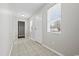 Foyer with tile floor, fresh paint, and natural light shining in from the front door at 410 Martin St., Mullins, SC 29574