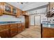 Kitchen featuring wood cabinetry, with tile backsplash at 410 Martin St., Mullins, SC 29574