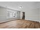 Inviting living room featuring hardwood floors, natural light, and an open layout at 410 Martin St., Mullins, SC 29574