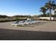 Picture of lounge chairs on the outside of the building by the beach and pool area at 4111 Ocean Blvd. S # 402, North Myrtle Beach, SC 29582