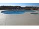 Enjoy this outdoor pool and hot tub with many chairs to relax on at 4111 Ocean Blvd. S # 402, North Myrtle Beach, SC 29582