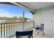 Comfortable screened balcony with seating and scenic views of the surrounding landscape at 4140 Hibiscus Dr. # 303, Little River, SC 29566