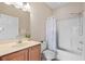 Well-lit bathroom featuring a vanity with ample counter space and a shower-tub combination at 4140 Hibiscus Dr. # 303, Little River, SC 29566