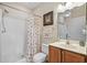 Bright bathroom featuring a vanity with ample counter space and a shower-tub combination at 4140 Hibiscus Dr. # 303, Little River, SC 29566