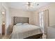 Comfortable bedroom with a full bed and dresser with easy access to the ensuite bathroom at 4140 Hibiscus Dr. # 303, Little River, SC 29566