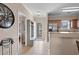 Welcoming entryway featuring tile floors, coat rack with bench, and access to the kitchen and living areas at 4140 Hibiscus Dr. # 303, Little River, SC 29566