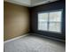 Cozy bedroom featuring neutral-colored walls and plush carpeting at 422 Cassian Way, Myrtle Beach, SC 29588