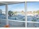 Beautiful pool and marina views from a screened-in porch at 4220 Coquina Harbour Dr. # B-12, Little River, SC 29566