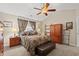 Comfortable bedroom featuring a ceiling fan, and decorative pillows at 4309 River Gate Ln., Little River, SC 29566