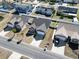 Aerial view of several homes in the neighborhood showcasing their yards and driveways at 453 Rycola Circle, Surfside Beach, SC 29575