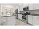 Bright kitchen featuring stainless steel appliances and lots of cabinet storage at 453 Rycola Circle, Surfside Beach, SC 29575