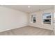 Carpeted bedroom featuring two large windows for lots of light at 467 Acosta Circle, Conway, SC 29527