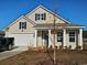 Charming single-story home with neutral siding, a two-car garage, and manicured front yard at 467 Acosta Circle, Conway, SC 29527