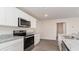 Modern kitchen featuring stainless steel appliances, granite counters, and white cabinetry at 467 Acosta Circle, Conway, SC 29527