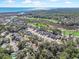 An aerial view reveals the house's location near a golf course, marsh, and the Atlantic Ocean at 48 Twelve Oaks Dr. # 2, Pawleys Island, SC 29585