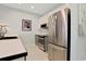 Modern kitchen featuring stainless steel appliances and white cabinetry at 48 Twelve Oaks Dr. # 2, Pawleys Island, SC 29585