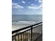 Overlooking the ocean, this balcony view showcases a sandy beach and beautiful water at 4800 Ocean Blvd. S # 1616, North Myrtle Beach, SC 29582