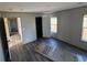 Bedroom with hardwood flooring, natural light, and a closet door at 495 N Green Sea Rd., Loris, SC 29569