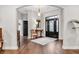 Charming foyer featuring hardwood flooring, and a decorative glass front door at 602 Sea Vista Ln., North Myrtle Beach, SC 29582