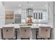 Modern kitchen showcasing a large center island with white countertops and stainless steel appliances at 602 Sea Vista Ln., North Myrtle Beach, SC 29582