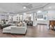 Bright and airy living room featuring hardwood floors and seamless access to the kitchen at 602 Sea Vista Ln., North Myrtle Beach, SC 29582