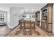 Home office featuring built-in bookshelves, hardwood floors, and a decorative rug at 602 Sea Vista Ln., North Myrtle Beach, SC 29582