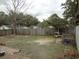 Spacious backyard featuring a weathered wood fence and potential for landscaping at 606 Dawson St., Georgetown, SC 29440