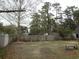 Backyard includes a wooden fence and provides a private outdoor space at 606 Dawson St., Georgetown, SC 29440