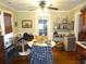 Dining room with hardwood floors, abundant light, and traditional decor at 606 Dawson St., Georgetown, SC 29440