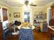 Bright dining area with hardwood floors, a ceiling fan, and eclectic furnishings at 606 Dawson St., Georgetown, SC 29440