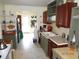 The kitchen features ample counter space and dark wood cabinets for plenty of storage space at 606 Dawson St., Georgetown, SC 29440