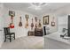 Guitar themed room with plush carpet, ceiling fan, white trim and walls and natural light at 641 Indigo Bay Circle, Myrtle Beach, SC 29579