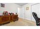 Bedroom featuring dresser, closet and decor with carpeted floor and natural light at 6494 Royal Pine Dr., Myrtle Beach, SC 29588