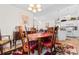 Inviting dining area with hardwood floors and plenty of natural light at 6494 Royal Pine Dr., Myrtle Beach, SC 29588