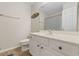 Bright bathroom with a white vanity, toilet, and a shower with a patterned curtain at 651 Riverward Dr. # 651, Myrtle Beach, SC 29588