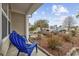 Inviting front porch with blue chairs and tasteful landscaping at 651 Riverward Dr. # 651, Myrtle Beach, SC 29588