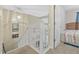 Hallway with carpeted stairs, white railings, and a doorway leading to a bedroom at 651 Riverward Dr. # 651, Myrtle Beach, SC 29588