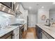 Updated kitchen featuring stainless steel appliances, an island, and white subway tile backsplash at 8035 Arcady St. # B, Myrtle Beach, SC 29572