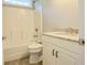 Bathroom with a granite countertop and white cabinetry at 8125 Living Tide Dr., Myrtle Beach, SC 29572