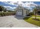 Detached one-car garage with a pristine driveway and well-maintained landscaping at 8156 Living Tide Dr., Myrtle Beach, SC 29572