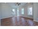 Bright and airy living room features hardwood floors, crown molding, and lots of natural light at 8156 Living Tide Dr., Myrtle Beach, SC 29572